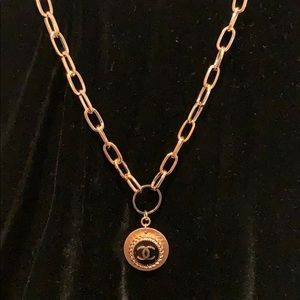 Authentic stamped Chanel button on necklace